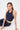 Mandala Fitness Top Blau Front sitzend - Cross Top