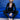 Schwarze Performance Legging mit hellen Details und schwarze Wickeljacke über rosefarbenen Sport-BH Mandala