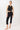 Mandala Active Top Schwarz Outfit Front - Cropped V-Neck